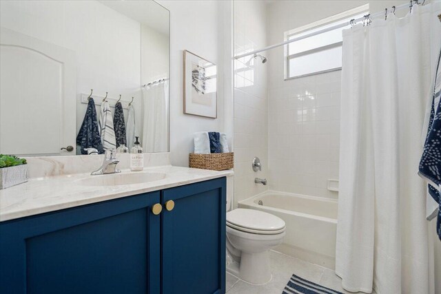 9961 SW Glenbrook Dr, Port Saint Lucie, FL 34987 - bathroom featuring shower / tub combo with curtain, toilet, tile patterned floors, and vanity