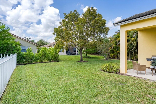 9961 SW Glenbrook Dr, Port Saint Lucie, FL 34987 - view of yard featuring fence and a patio area