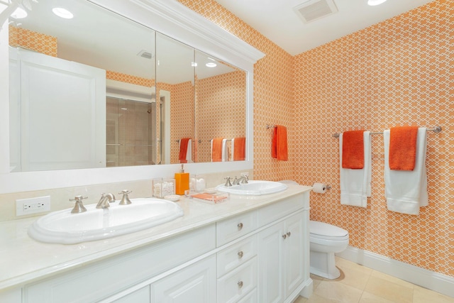 full bath featuring toilet, tile patterned floors, a sink, and visible vents