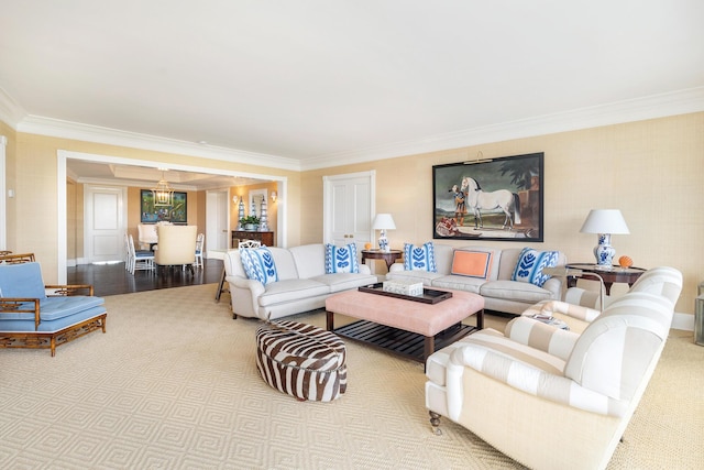 carpeted living room with ornamental molding