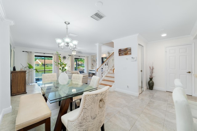 902 Maplewood Dr, Greenacres, FL 33415 - dining area featuring a notable chandelier, stairway, baseboards, visible vents, and ornamental molding