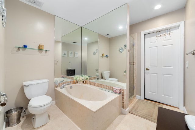 902 Maplewood Dr, Greenacres, FL 33415 - full bath featuring a stall shower, toilet, a garden tub, tile patterned flooring, and visible vents