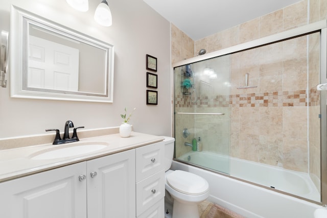 902 Maplewood Dr, Greenacres, FL 33415 - bathroom featuring toilet, shower / bath combination with glass door, and vanity