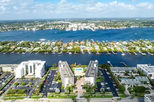 birds eye view of property featuring a water view