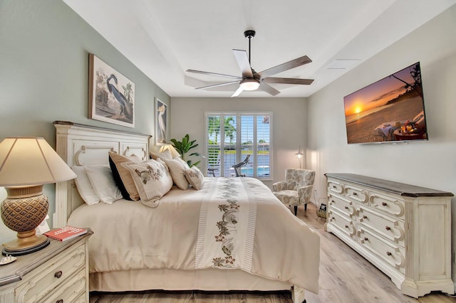 7147 Prudencia Dr, Lake Worth, FL 33463 - bedroom with access to exterior, light wood finished floors, and ceiling fan