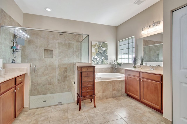 7147 Prudencia Dr, Lake Worth, FL 33463 - full bath featuring a stall shower, vanity, a garden tub, and tile patterned floors