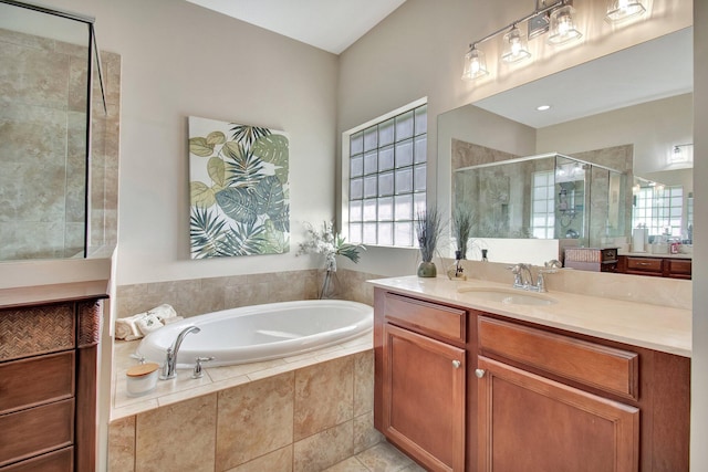 7147 Prudencia Dr, Lake Worth, FL 33463 - full bathroom featuring vanity, a garden tub, and a shower stall
