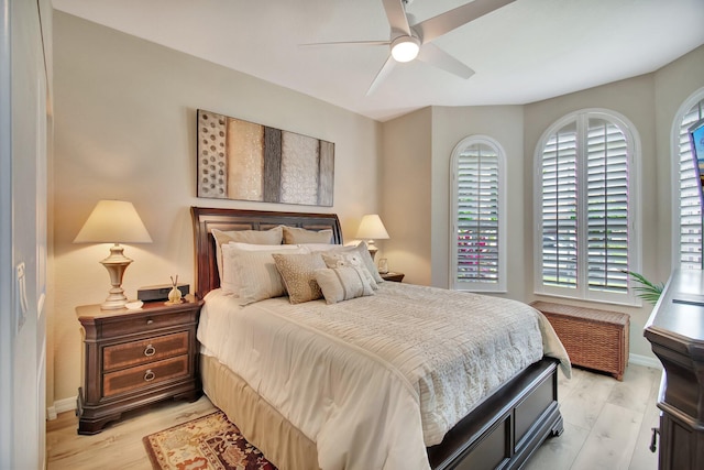 7147 Prudencia Dr, Lake Worth, FL 33463 - bedroom with baseboards, light wood-style floors, and a ceiling fan