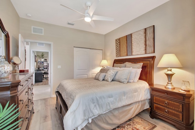 7147 Prudencia Dr, Lake Worth, FL 33463 - bedroom with a closet, light wood finished floors, and ceiling fan