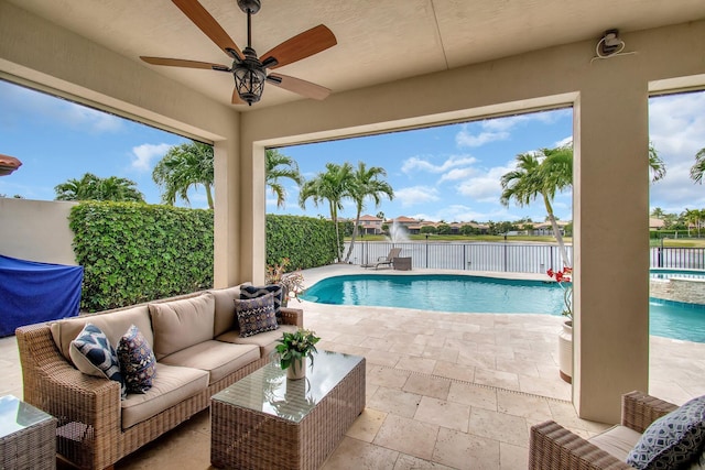 7147 Prudencia Dr, Lake Worth, FL 33463 - view of pool featuring a fenced backyard, a ceiling fan, an outdoor hangout area, a patio, and a pool with connected hot tub