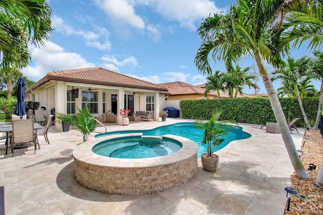 7147 Prudencia Dr, Lake Worth, FL 33463 - view of pool featuring ceiling fan, an outdoor living space, a patio area, and a pool with connected hot tub