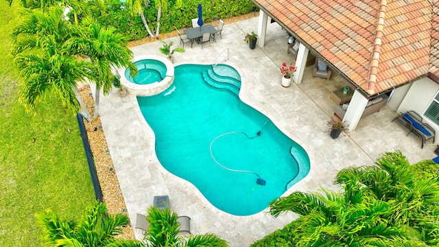 7147 Prudencia Dr, Lake Worth, FL 33463 - view of pool with a patio area, outdoor dining area, and a pool with connected hot tub