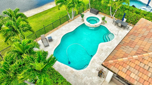 7147 Prudencia Dr, Lake Worth, FL 33463 - view of pool with a patio area, a fenced backyard, and a pool with connected hot tub