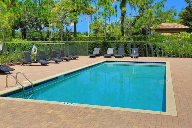 7147 Prudencia Dr, Lake Worth, FL 33463 - community pool with a patio area