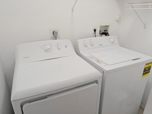 washroom featuring separate washer and dryer