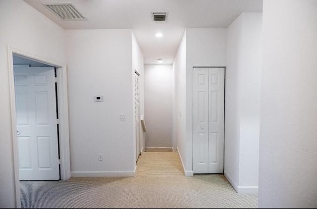 10403 Wellington Parc Dr, Wellington, FL 33449 - hall featuring light carpet, baseboards, visible vents, and recessed lighting
