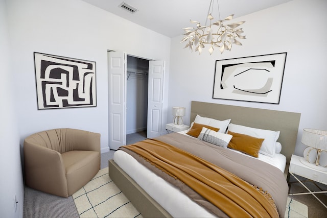 10403 Wellington Parc Dr, Wellington, FL 33449 - bedroom with a closet, light colored carpet, visible vents, baseboards, and a notable chandelier