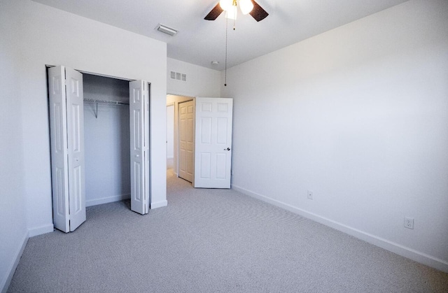 10403 Wellington Parc Dr, Wellington, FL 33449 - unfurnished bedroom featuring visible vents, light colored carpet, and baseboards