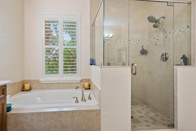 5264 Cambridge Ct, Palm Beach Gardens, FL 33418 - bathroom with a garden tub, a shower stall, plenty of natural light, and vanity