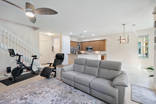 5264 Cambridge Ct, Palm Beach Gardens, FL 33418 - living room featuring light tile patterned floors, a ceiling fan, baseboards, a chandelier, and recessed lighting