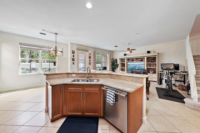 5264 Cambridge Ct, Palm Beach Gardens, FL 33418 - kitchen with dishwasher, a sink, open floor plan, light tile patterned floors, and plenty of natural light