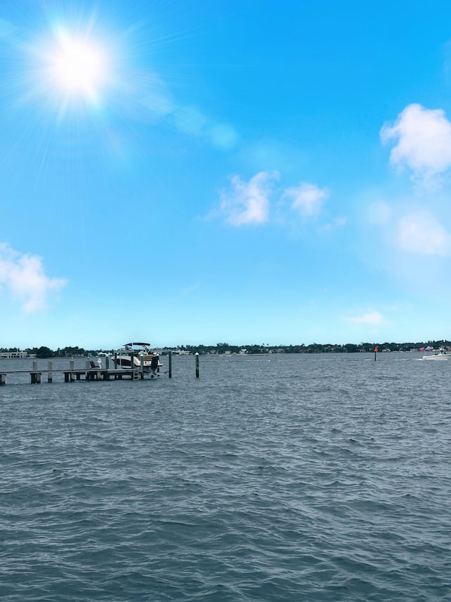 property view of water with a boat dock and boat lift
