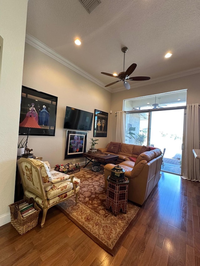 3112 Bollard Rd, West Palm Beach, FL 33411 - living area featuring ornamental molding, dark wood-type flooring, a textured ceiling, a ceiling fan, and recessed lighting