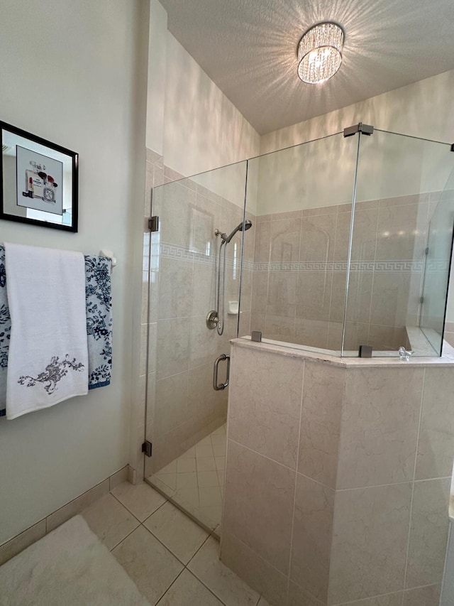 3112 Bollard Rd, West Palm Beach, FL 33411 - bathroom featuring a stall shower and tile patterned floors