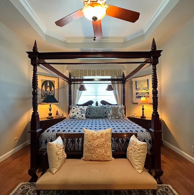 3112 Bollard Rd, West Palm Beach, FL 33411 - bedroom featuring wood finished floors, baseboards, crown molding, ceiling fan, and a raised ceiling