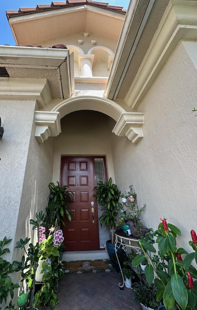 3112 Bollard Rd, West Palm Beach, FL 33411 - property entrance featuring stucco siding