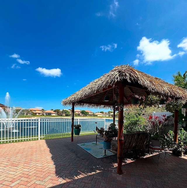 3112 Bollard Rd, West Palm Beach, FL 33411 - view of patio / terrace featuring a gazebo and a water view