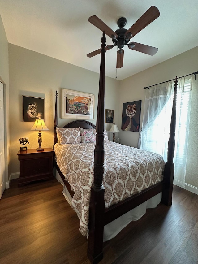 3112 Bollard Rd, West Palm Beach, FL 33411 - bedroom featuring wood finished floors, baseboards, and ceiling fan