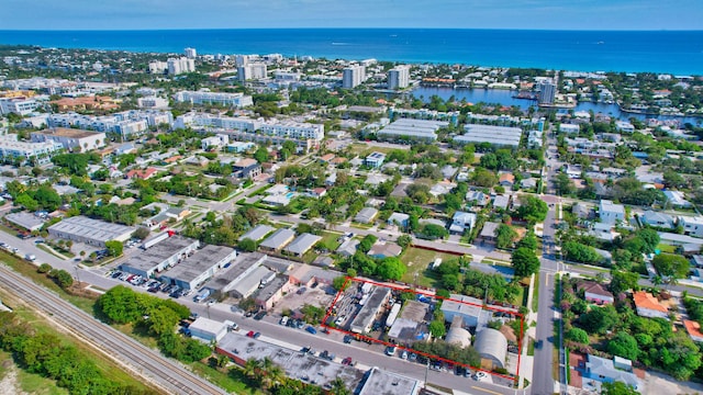 383 SE 2nd Ave, Delray Beach, FL 33483 - aerial view of property and surrounding area featuring property parcel outlined, a large body of water, and nearby urban area