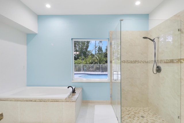 13209 Temple Blvd, West Palm Beach, FL 33412 - full bath featuring a shower stall, a bath, recessed lighting, and tile patterned floors