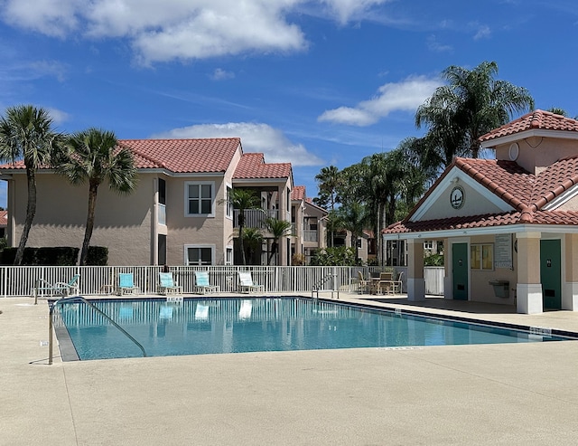 9851 Perfect Dr Unit 151, Port Saint Lucie, FL 34986 - community pool with a patio