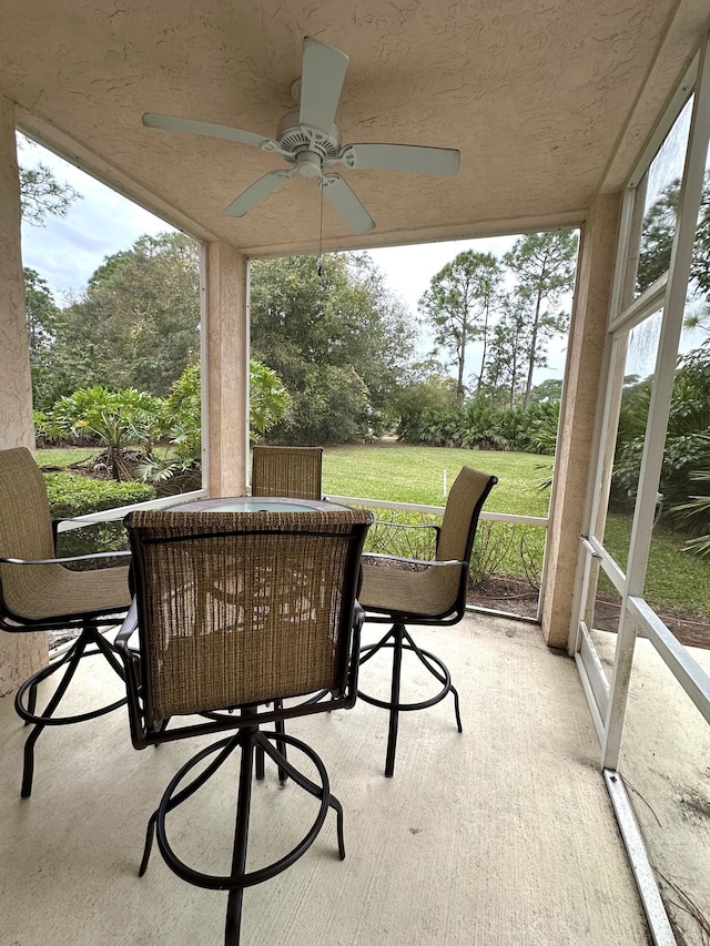 9851 Perfect Dr Unit 151, Port Saint Lucie, FL 34986 - sunroom with a ceiling fan and outdoor dining space