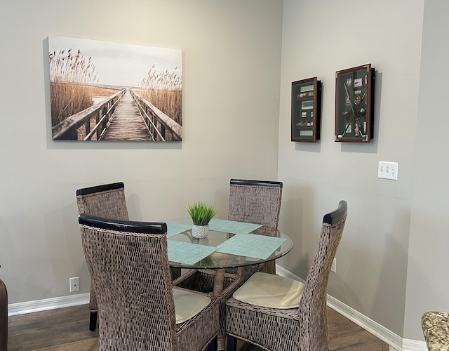 9851 Perfect Dr Unit 151, Port Saint Lucie, FL 34986 - dining space featuring wood finished floors and baseboards
