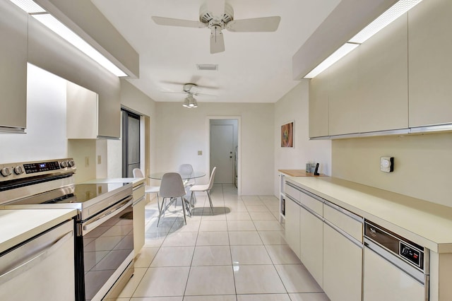 45 Eastgate Dr Unit B, Boynton Beach, FL 33436 - dining area with light tile patterned floors and ceiling fan
