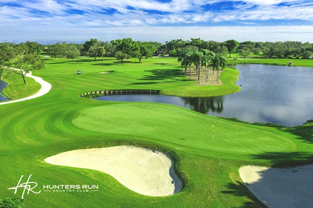 45 Eastgate Dr Unit B, Boynton Beach, FL 33436 - view of home's community featuring a water view, golf course view, and a lawn