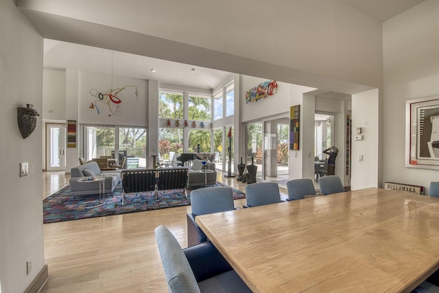 1440 Breakers W Blvd, West Palm Beach, FL 33411 - dining area with a high ceiling and wood finished floors