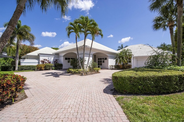 1440 Breakers W Blvd, West Palm Beach, FL 33411 - single story home featuring stucco siding