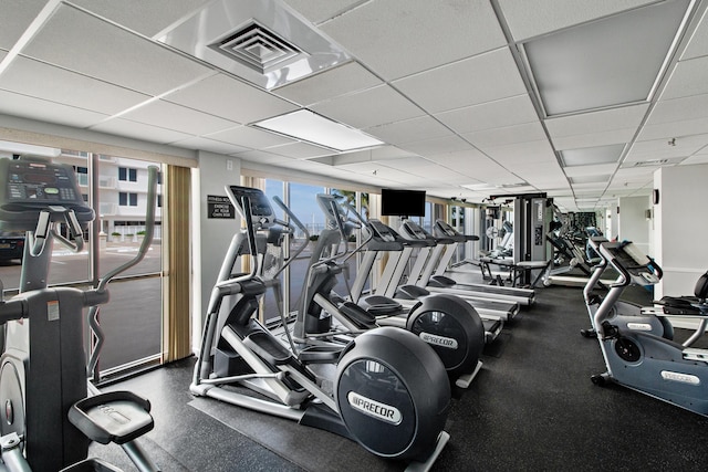 3215 S Ocean Blvd Unit 707, Highland Beach, FL 33487 - workout area featuring a paneled ceiling