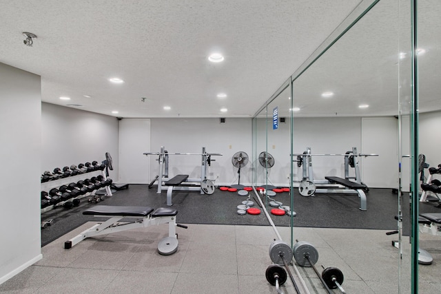 3215 S Ocean Blvd Unit 707, Highland Beach, FL 33487 - workout area featuring recessed lighting, a textured ceiling, and baseboards