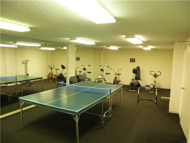 3215 S Ocean Blvd Unit 707, Highland Beach, FL 33487 - recreation room with a textured ceiling and carpet flooring