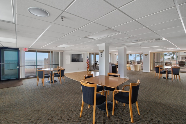 3215 S Ocean Blvd Unit 707, Highland Beach, FL 33487 - dining room with carpet floors, a paneled ceiling, and baseboards