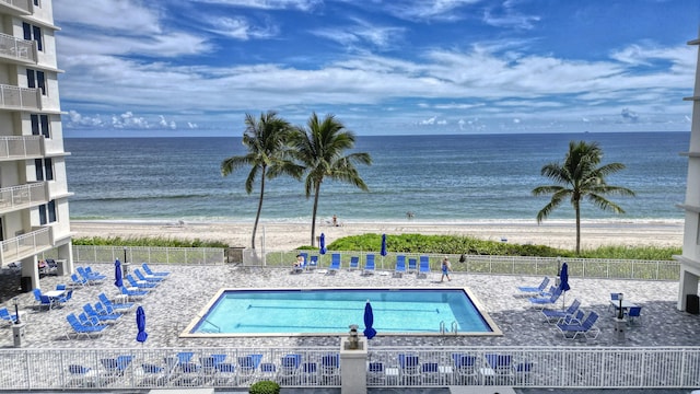 3215 S Ocean Blvd Unit 707, Highland Beach, FL 33487 - community pool featuring fence, view of water and beach, and a patio