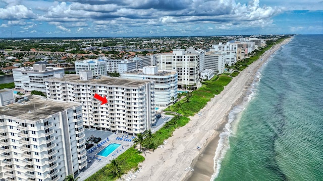 3215 S Ocean Blvd Unit 707, Highland Beach, FL 33487 - drone / aerial view of expansive coastline, apartment complex / building, and a pool area