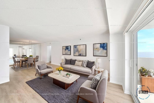 3215 S Ocean Blvd Unit 707, Highland Beach, FL 33487 - living area with light wood-style flooring