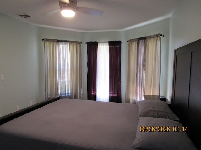 443 SW Homeland Rd, Port Saint Lucie, FL 34953 - bedroom with visible vents and a ceiling fan