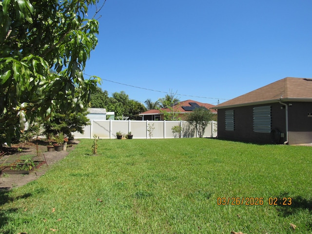 443 SW Homeland Rd, Port Saint Lucie, FL 34953 - view of yard featuring fence and a patio area